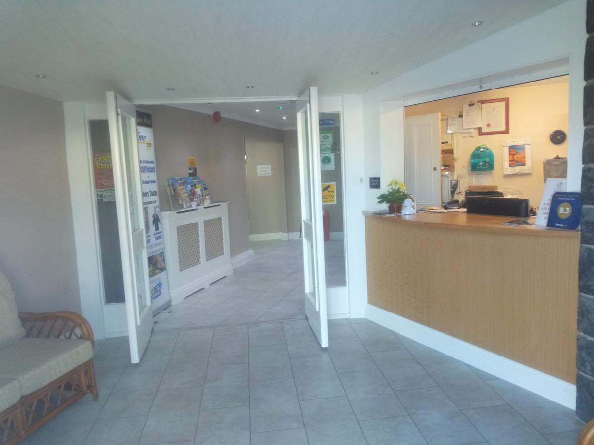 Wayside Cheer Hotel Castel Exterior foto